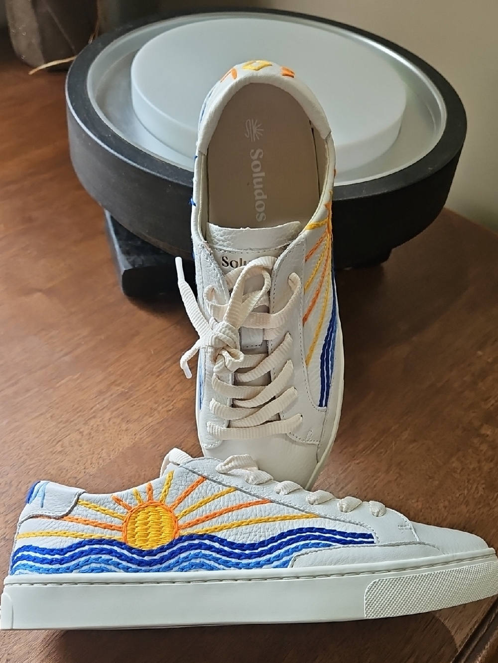 Soludos White Sneakers with Embroidered Sunrise and Blue Waves